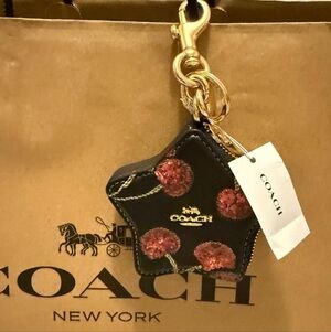 Coach Black Star Leather Key Charm with Pink Sequin Flowers